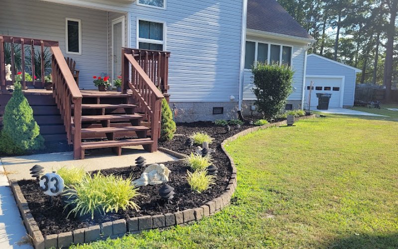 The Outdoorsman Lawn and Landscape